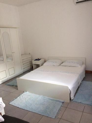 Ένα ή περισσότερα κρεβάτια σε δωμάτιο στο Jelena Apartment
