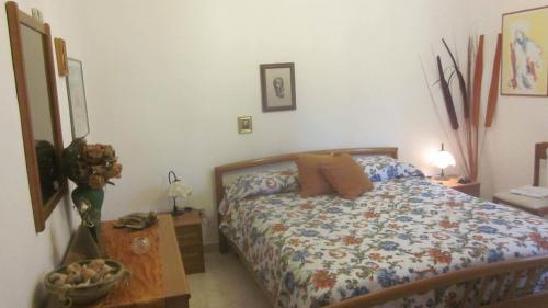 Een bed of bedden in een kamer bij Via Valentino mazzola 5