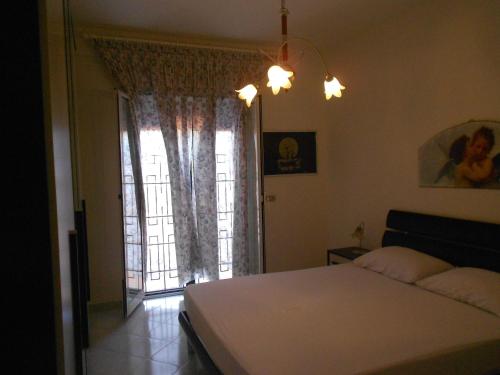 Ένα ή περισσότερα κρεβάτια σε δωμάτιο στο Casa Magnolia