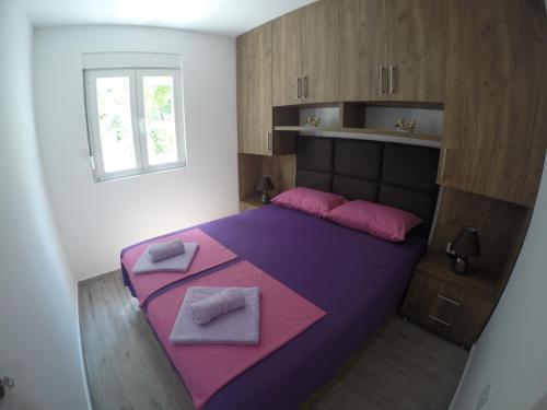 Un ou plusieurs lits dans un hébergement de l'établissement Apartments Djedovic 2