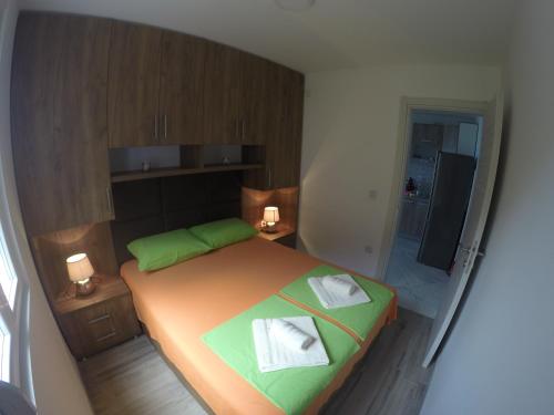 Un ou plusieurs lits dans un hébergement de l'établissement Apartments Djedovic 2