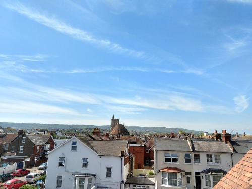 a view of a city with houses and cars at By The Sea Bed and Breakfast in Eastbourne