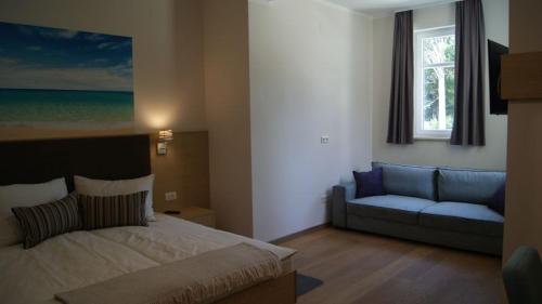 Postel nebo postele na pokoji v ubytování Villa Emilia