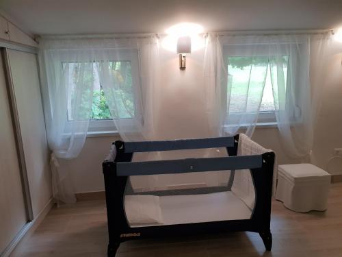 A bed or beds in a room at Levendula Nyaraló