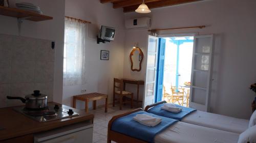 Postel nebo postele na pokoji v ubytování Hotel Hara