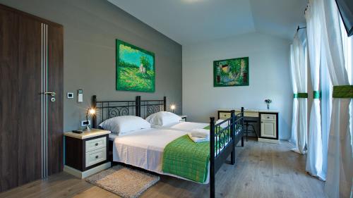 Katil atau katil-katil dalam bilik di Villa Lorena