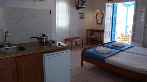 Postel nebo postele na pokoji v ubytování Hotel Hara