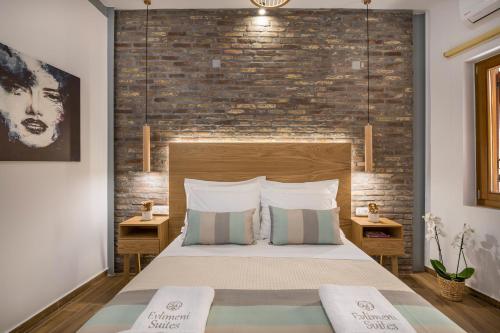 Кровать или кровати в номере Evlimeni Suites