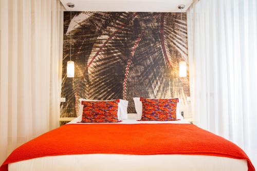 Katil atau katil-katil dalam bilik di Hôtel La Dimora & Spa