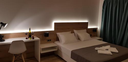 Ein Bett oder Betten in einem Zimmer der Unterkunft First House
