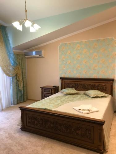 En eller flere senge i et værelse på Дворівневі Апартаменти Antique