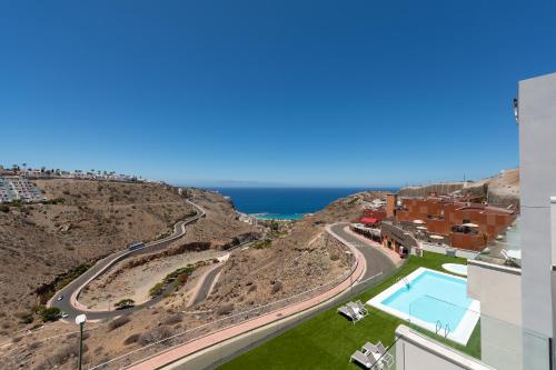 a view of the ocean from a building at Beyond Amadores by Vector in Mogán
