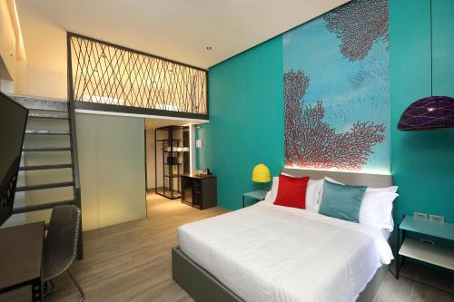 Llit o llits en una habitació de Lagùn Hotel