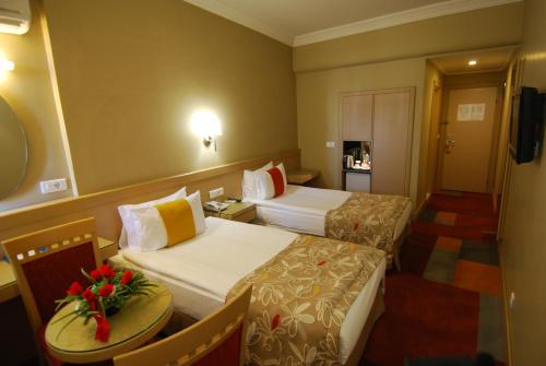 Katil atau katil-katil dalam bilik di SV Business Hotel Diyarbakır