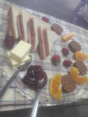 a plate of food with different types of food at Makedonia Studios at Harbour of Kamiros Skala in Kamiros