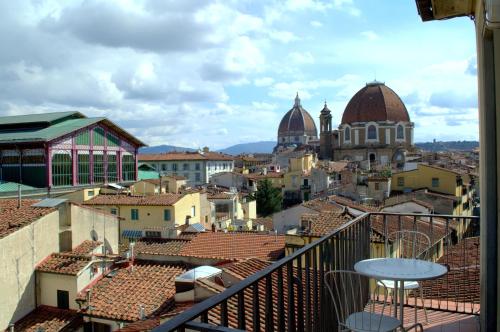 a view of a city from a balcony at Hotel Machiavelli Palace in Florence