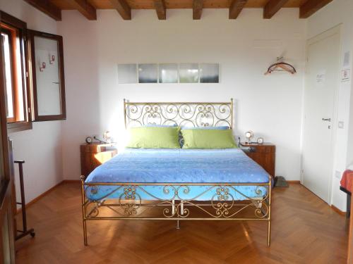 Ένα ή περισσότερα κρεβάτια σε δωμάτιο στο B&B Via Punta 8