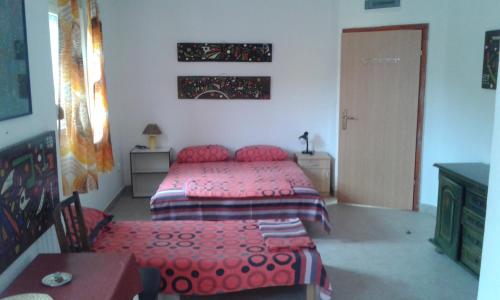 מיטה או מיטות בחדר ב-Danijela Apartmani