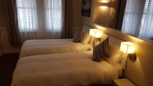 MacLean Guest Houseにあるベッド