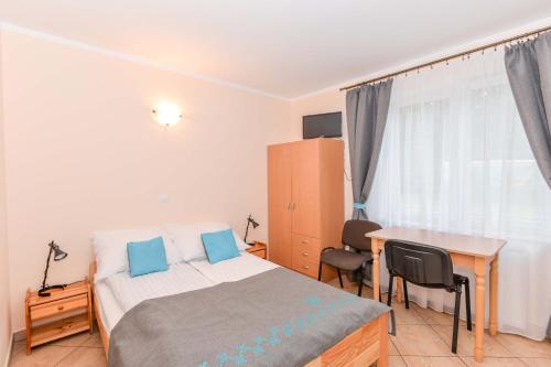 Postel nebo postele na pokoji v ubytování Šilainė Recreation & Leisure