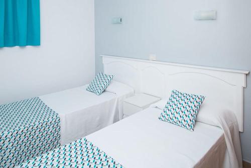 Voodi või voodid majutusasutuse Montesol Atsol toas
