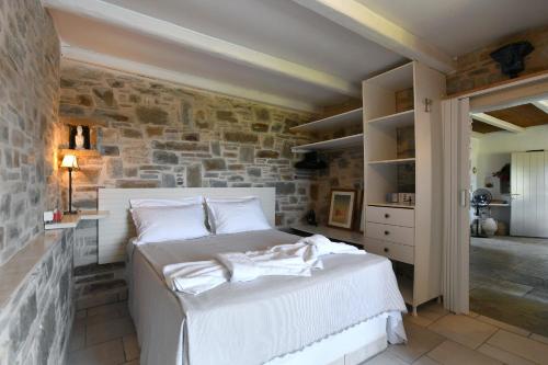 Giường trong phòng chung tại Villa Callista