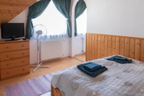 Postel nebo postele na pokoji v ubytování Park Apartman Hévíz