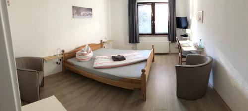 Hotel am Weißdornbuschにあるベッド