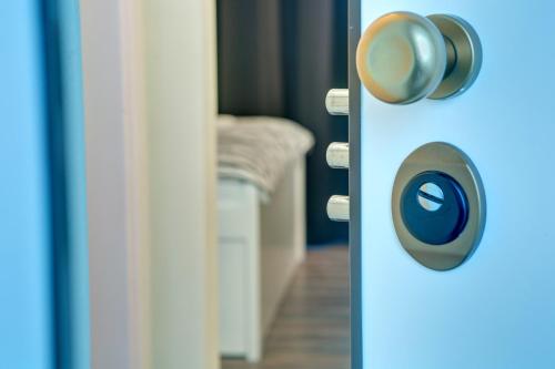 a door with a door knob in a room at Luxury Studio Yasmine in Mostar