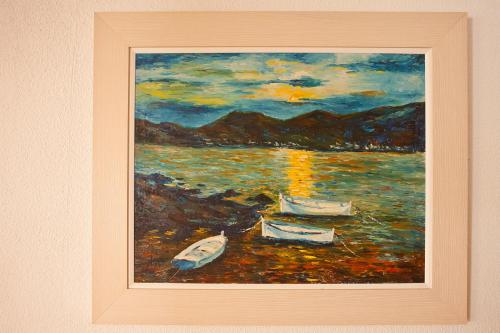a painting of a painting of boats on the water at Galaxia Boutique Hotel in Can Picafort