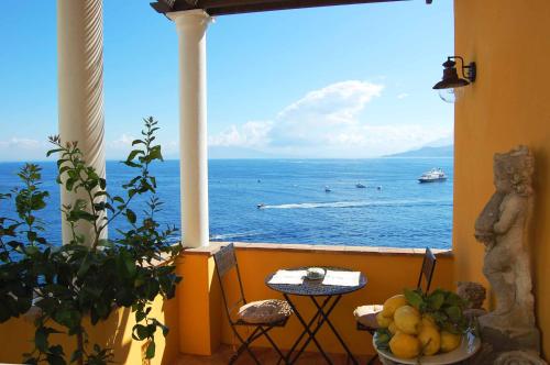 a view of the ocean from a balcony at La Terrazza sul Mare in Capri