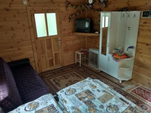 TV a/nebo společenská místnost v ubytování Basturk Dinlenme Tesisi