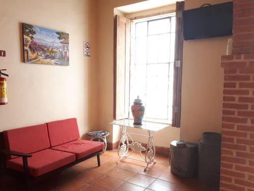 TV a/nebo společenská místnost v ubytování Hotel Rincón Poblano