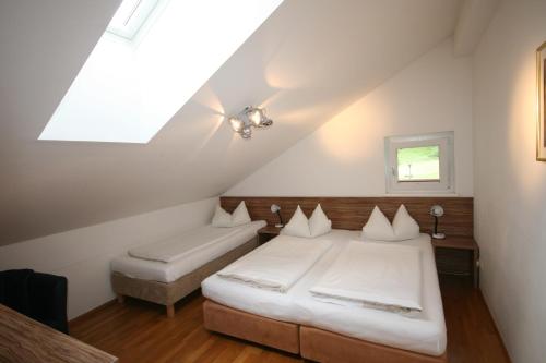 Appartements Zur Kapelleにあるベッド