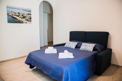 Posteľ alebo postele v izbe v ubytovaní Francesco B&B - Torre Canne