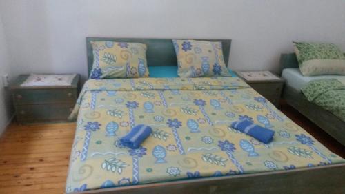 Cama ou camas em um quarto em Guesthouse Hurma Rooms