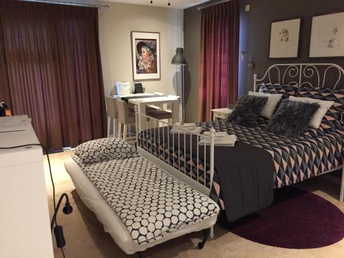 Posteľ alebo postele v izbe v ubytovaní B&B Maison Saint Tropez Eindhoven