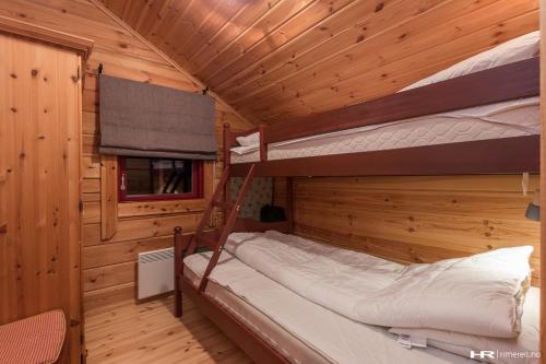 Divstāvu gulta vai divstāvu gultas numurā naktsmītnē Vrådal Panorama - Tiuråsvegen 39