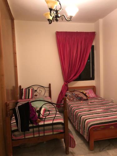 Ένα ή περισσότερα κρεβάτια σε δωμάτιο στο Wonderful Apartment