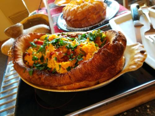 a plate of food on top of a table at Inn on the Rio in Taos