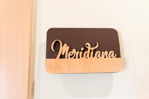 a sign for a refrigerator with the word marmite at La Torre del Tempo in Turi