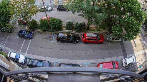 a group of cars parked in a parking lot at Room 4 two in Rijeka