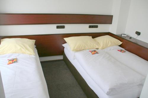 Katil atau katil-katil dalam bilik di Akzent Hotel Oberhausen