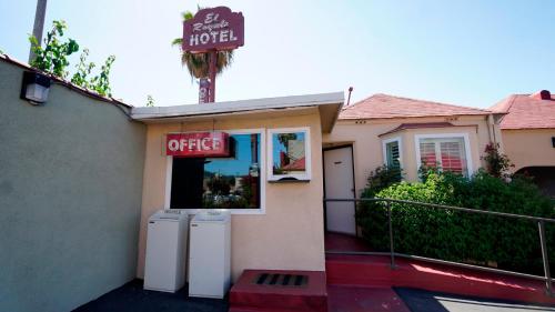 a hotel with two refrigerators in front of a building at El Royale Hotel - Near Universal Studios Hollywood in Los Angeles