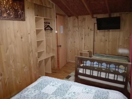 TV a/nebo společenská místnost v ubytování Hospedaje Los Calafates