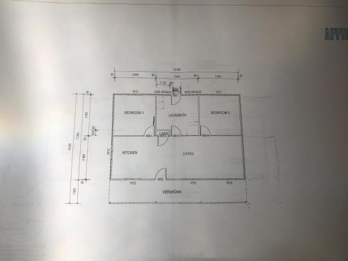a drawing of a floor plan of a bathroom at Singleton Rose Cottages in Singleton