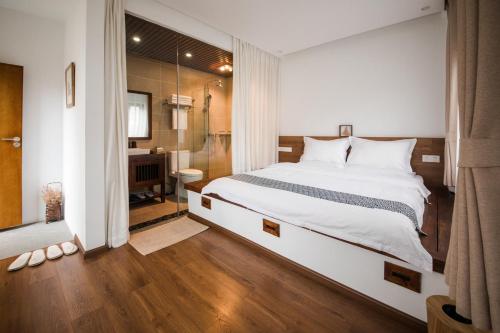 Dali Rong lu Hotelにあるベッド
