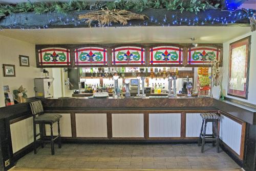 The lounge or bar area at Tollgate Hotel & Leisure 
