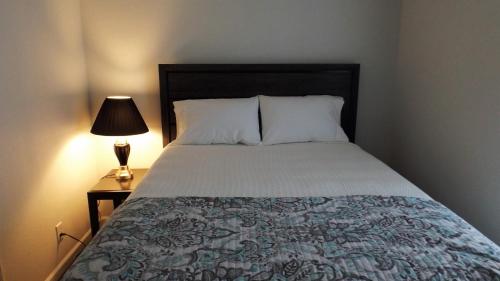 Ένα ή περισσότερα κρεβάτια σε δωμάτιο στο Campbell's Accommodations
