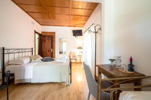 Katil atau katil-katil dalam bilik di Villa Montegenco